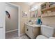 Clean bathroom with updated vanity and toilet at 6774 Treehaven Dr, Spring Hill, FL 34606