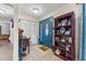 Inviting entryway with built-in shelving and storage at 6774 Treehaven Dr, Spring Hill, FL 34606