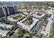 Apartment complex with a central courtyard, surrounded by buildings and parking at 6915 Avenue Des Palais # 2B, South Pasadena, FL 33707