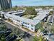 Aerial view of an apartment building complex with ample parking and landscaping at 6915 Avenue Des Palais # 2B, South Pasadena, FL 33707