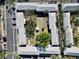 Aerial view of community with courtyard and putting green at 6915 Avenue Des Palais # 2B, South Pasadena, FL 33707