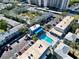 Complex featuring a community pool and ample parking at 6915 Avenue Des Palais # 2B, South Pasadena, FL 33707