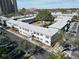 Aerial view of apartment buildings, a courtyard, and parking lot at 6915 Avenue Des Palais # 2B, South Pasadena, FL 33707