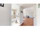Simple bathroom with beige tile and a white vanity at 6915 Avenue Des Palais # 2B, South Pasadena, FL 33707
