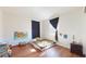Spacious bedroom with wood-look flooring and plenty of natural light at 6915 Avenue Des Palais # 2B, South Pasadena, FL 33707