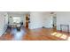 Bright living room with hardwood floors at 6915 Avenue Des Palais # 2B, South Pasadena, FL 33707