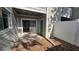 Private backyard with a patio and access to the interior at 7298 Ulmerton Rd # 202, Largo, FL 33771