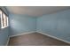 Light blue bedroom with tile floors and neutral walls at 7298 Ulmerton Rd # 202, Largo, FL 33771