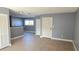 Living room with tile floors and neutral-colored walls at 7298 Ulmerton Rd # 202, Largo, FL 33771