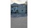 Condo building with parking lot in front at 7298 Ulmerton Rd # 202, Largo, FL 33771