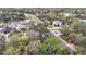 Aerial view of neighborhood, featuring homes and surrounding landscape at 8517 Hepp St, Tampa, FL 33615