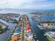 Aerial view of home's location on a canal in a residential area at 861 Symphony Isles Blvd, Apollo Beach, FL 33572