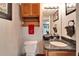 Basement bathroom with granite vanity and updated fixtures at 861 Symphony Isles Blvd, Apollo Beach, FL 33572