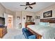 Bedroom with king-size bed and built-in cabinetry at 861 Symphony Isles Blvd, Apollo Beach, FL 33572