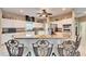 Modern kitchen with stainless steel appliances and an island at 861 Symphony Isles Blvd, Apollo Beach, FL 33572