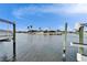Scenic waterfront view with boats and houses at 861 Symphony Isles Blvd, Apollo Beach, FL 33572