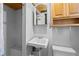 Small bathroom with shower, sink, and toilet at 930 15Th N Ave, St Petersburg, FL 33704