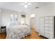 Cozy bedroom featuring hardwood floors and ample closet space at 930 15Th N Ave, St Petersburg, FL 33704