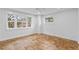 Bright bedroom with hardwood floors and large windows at 930 15Th N Ave, St Petersburg, FL 33704