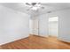 Well-lit bedroom with hardwood floors and ceiling fan at 930 15Th N Ave, St Petersburg, FL 33704