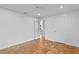 Spacious bedroom with hardwood floors and access to another room at 930 15Th N Ave, St Petersburg, FL 33704