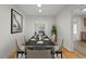 Formal dining room with black table and modern chairs at 930 15Th N Ave, St Petersburg, FL 33704