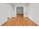 Bright dining room with hardwood floors and arched entryway at 930 15Th N Ave, St Petersburg, FL 33704