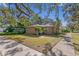 Brick home with landscaped yard and sidewalk at 930 15Th N Ave, St Petersburg, FL 33704