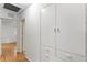 Bright hallway with hardwood floors and built-in storage at 930 15Th N Ave, St Petersburg, FL 33704
