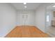 Hardwood floor living room with French doors at 930 15Th N Ave, St Petersburg, FL 33704