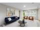 Cozy living room with a navy blue couch and armchairs at 930 15Th N Ave, St Petersburg, FL 33704