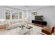 Bright living room with large windows and stylish furniture at 930 15Th N Ave, St Petersburg, FL 33704