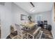 Dining room features a wooden table and built-in bench seating at 10405 White Peacock Pl, Riverview, FL 33578