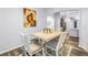 Bright dining area with a wooden table and six chairs at 10405 White Peacock Pl, Riverview, FL 33578