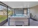 Relax in this covered hot tub with a convenient step at 10405 White Peacock Pl, Riverview, FL 33578