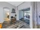 View of a sliding glass door leading to a relaxing screened-in patio at 10405 White Peacock Pl, Riverview, FL 33578