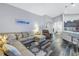 Open floor plan living room with a view of the kitchen at 10405 White Peacock Pl, Riverview, FL 33578