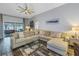 Relaxing living room featuring a large sectional sofa at 10405 White Peacock Pl, Riverview, FL 33578