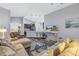 Open concept living room and kitchen with wood-look floors at 10405 White Peacock Pl, Riverview, FL 33578