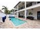 Relaxing pool and spa with ample patio space for entertaining at 105 Wimbledon Ct, Redington Shores, FL 33708