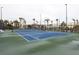 Well-maintained tennis court in a resort-style setting at 105 Wimbledon Ct, Redington Shores, FL 33708