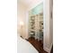 Well-organized closet with built-in shelves and drawers at 105 Wimbledon Ct, Redington Shores, FL 33708