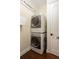 Laundry room with stacked washer and dryer at 105 Wimbledon Ct, Redington Shores, FL 33708