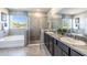 Spa-like bathroom with soaking tub and shower at 10585 Bridgegate Heights Loop, San Antonio, FL 33576