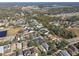 Aerial view of a residential neighborhood showcasing houses and landscaping at 11140 Irish Moss Ave, Riverview, FL 33569