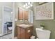 Simple bathroom with a vanity, toilet and view of another room at 11140 Irish Moss Ave, Riverview, FL 33569