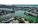 Aerial perspective of coastal neighborhood at 11650 4Th E St, Treasure Island, FL 33706