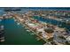 Aerial view showcasing waterfront homes and canals at 11650 4Th E St, Treasure Island, FL 33706