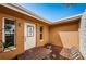 Front entrance with white door and brick walkway at 11650 4Th E St, Treasure Island, FL 33706