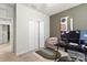 Bedroom with gray wall, window blinds and work desk at 12152 Ledbury Commons Dr, Gibsonton, FL 33534